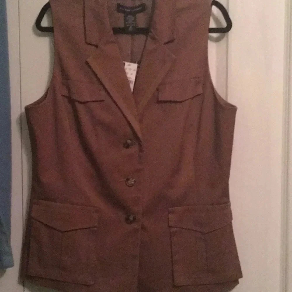 NYC sleeveless suit top and matching skirt